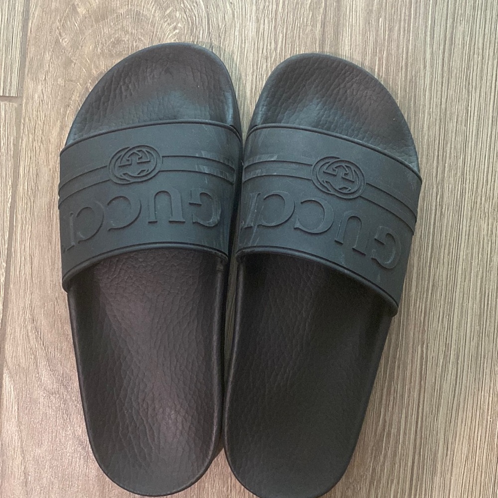 Women’s Gucci pool slides-size 37 US 7 excellent used condition. No box.